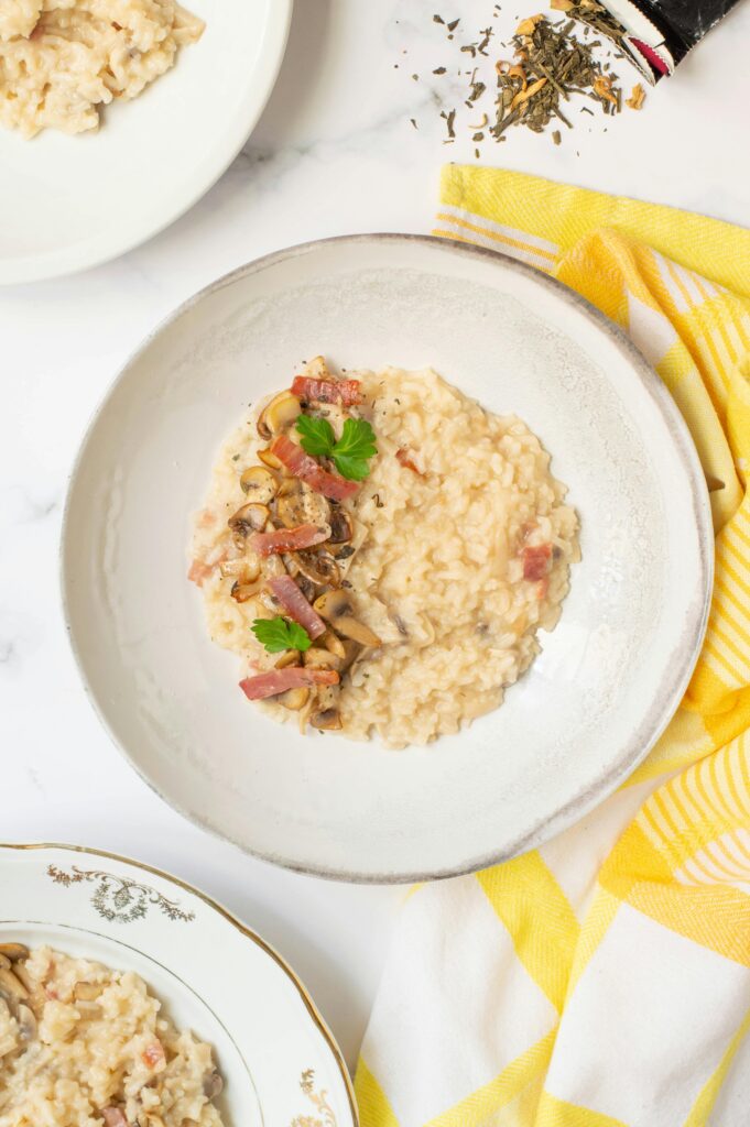 Risotto con funghi, guanciale e taleggio